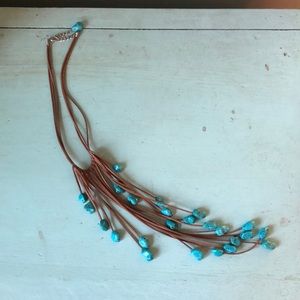 Turquoise colored stone and leather boho necklace